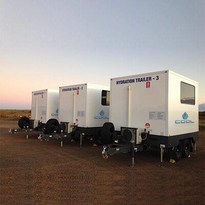 Coolworker solar powered hydration trailers parked on worksite